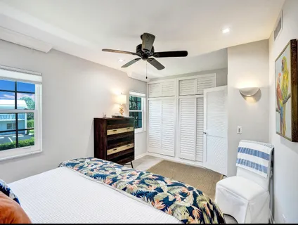 a bedroom with a bed and furniture