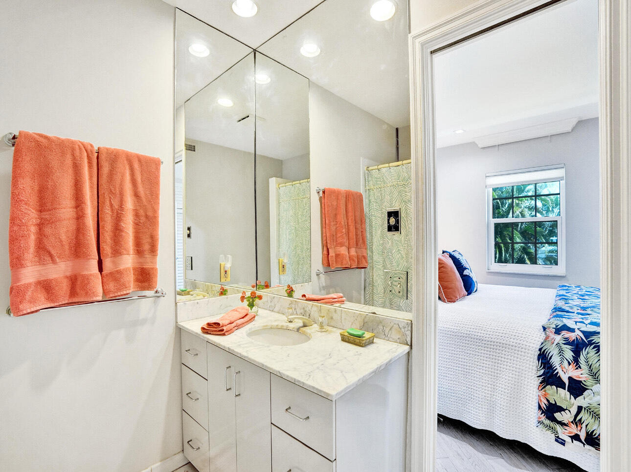 6590 North Ocean Boulevard, Unit 9 Ocean Ridge, FL 33435 - Photo 15 of 18 a bathroom with a sink and a mirror