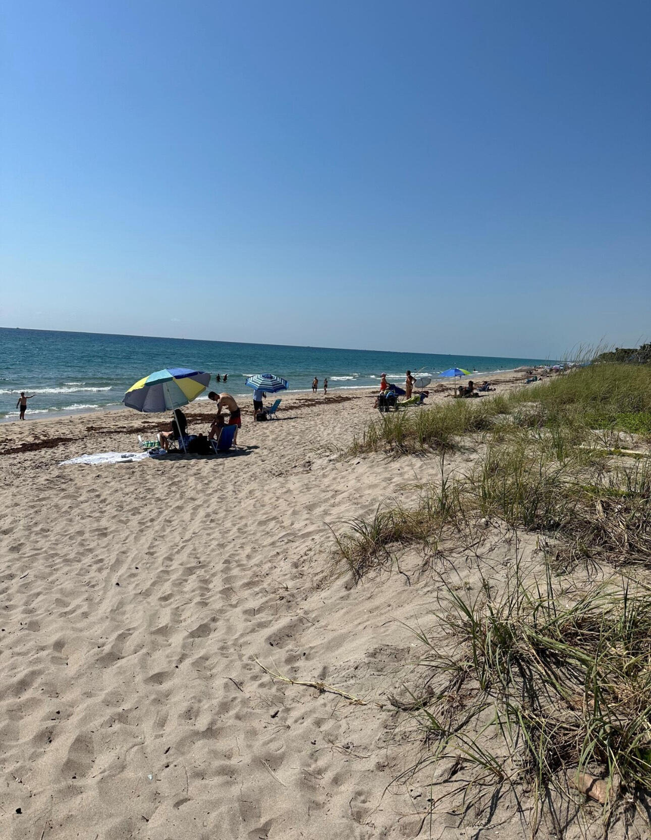 6590 North Ocean Boulevard, Unit 9 Ocean Ridge, FL 33435 - Photo 18 of 18 a view of car parked on the road