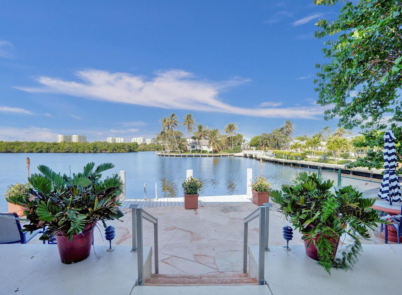 6590 North Ocean Boulevard, Unit 9 Ocean Ridge, FL 33435 - Photo 3 of 18 a view of a lake with a terrace