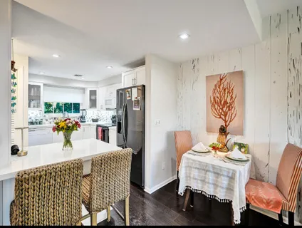 a dining room with furniture and a table