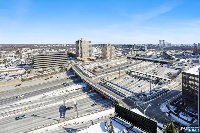 a view of a city with tall buildings