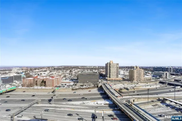 a view of a city with tall buildings