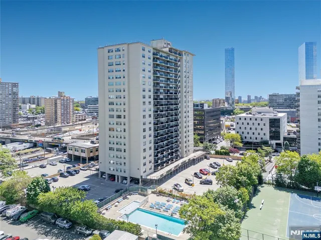 a view of a city with tall buildings