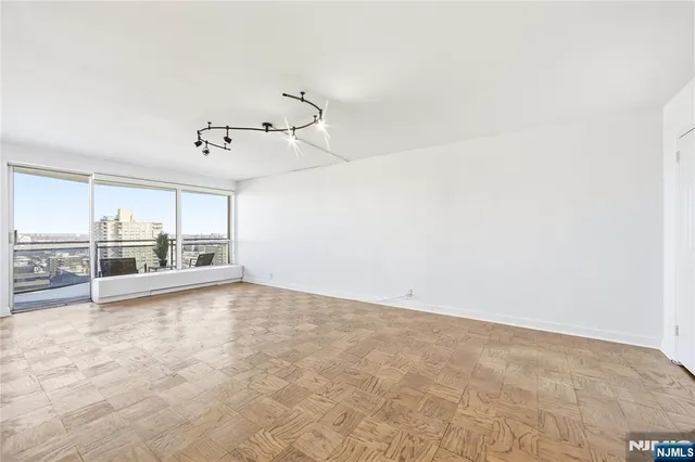 a view of a kitchen with a sink