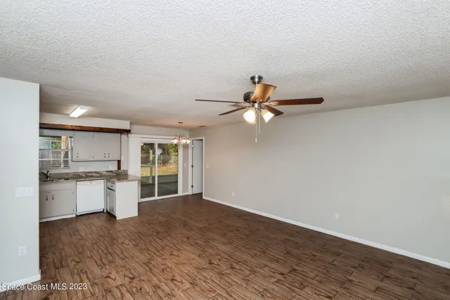 a view of a kitchen with a sink and dishwasher