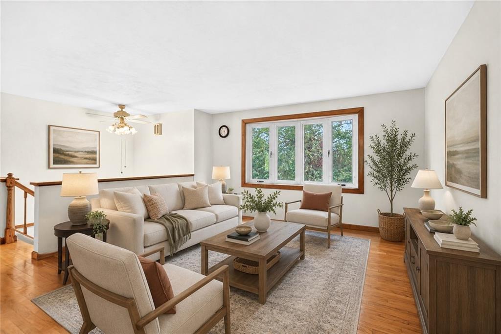 224 Bowman Road Bridgeville, PA 15017 - Photo 5 of 50 And this is just one possibility for this blank canvas! The space lends itself to whatever you can dream! Neutral back drop? Check! Hardwood floors? Check! Bay window overlooking the woods? Check! What is not to love!