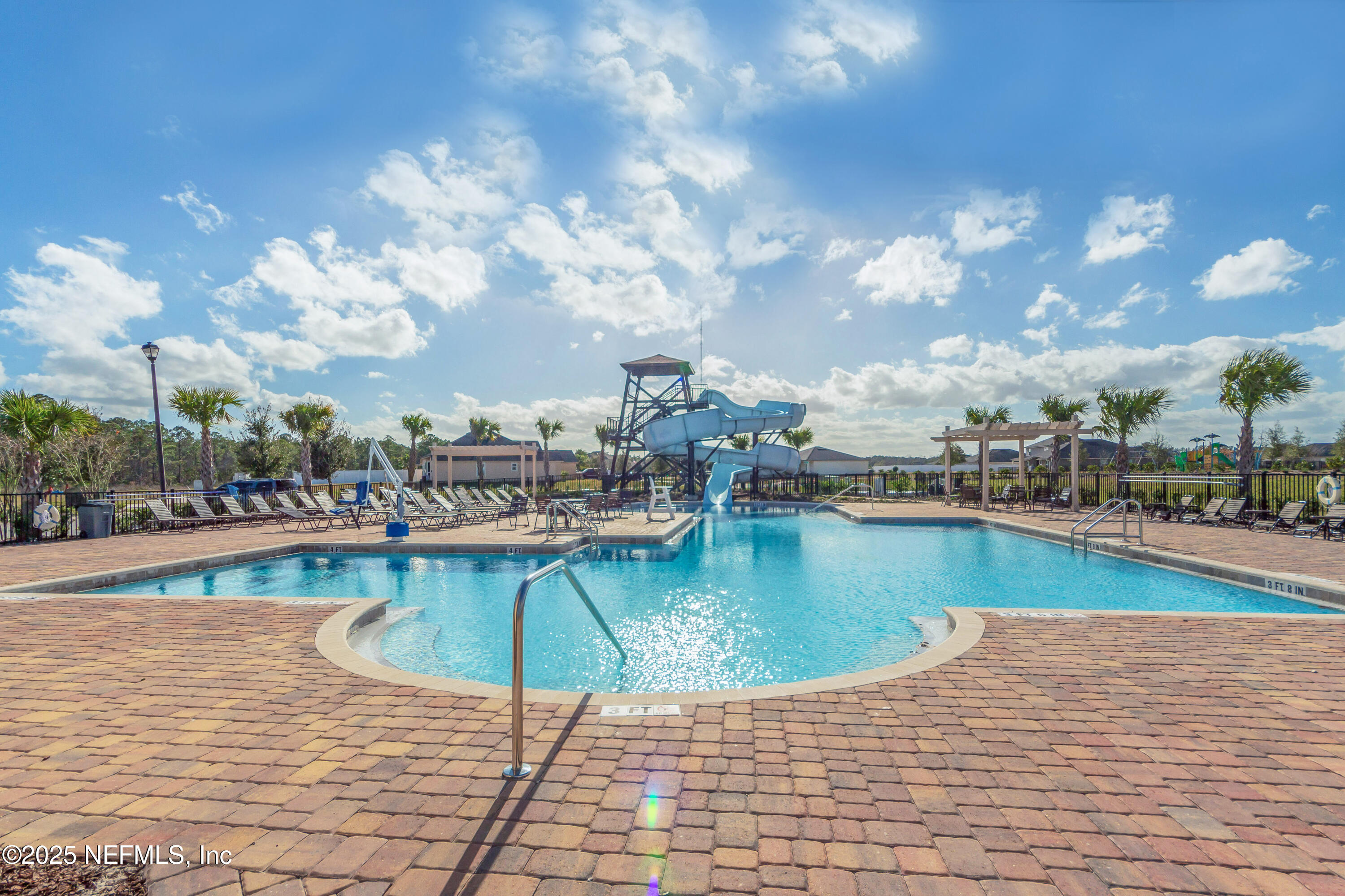 4100 Spring Creek Lane Middleburg, FL 32068 - Photo 41 of 58 a view of a swimming pool with outdoor seating