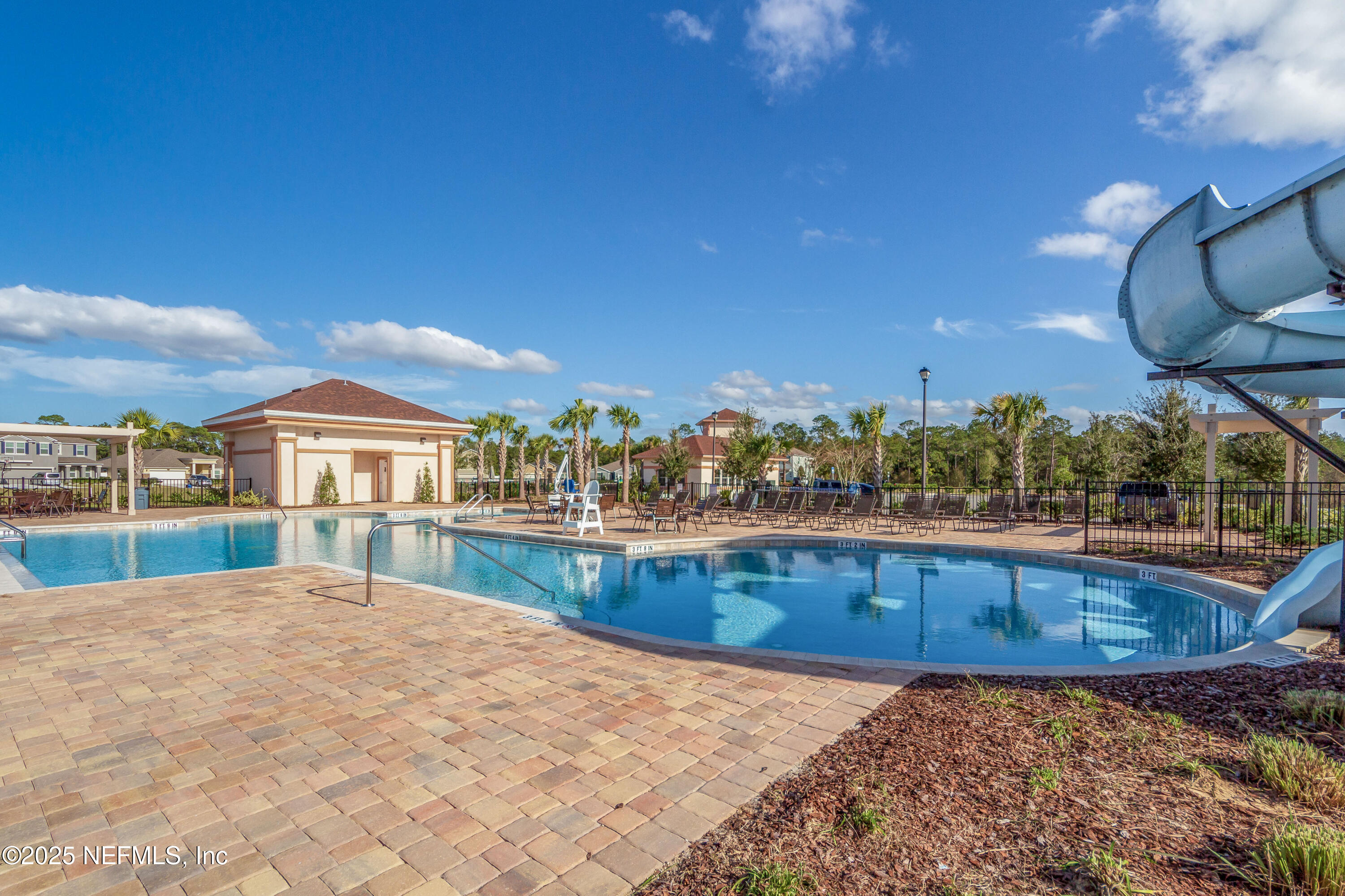 4100 Spring Creek Lane Middleburg, FL 32068 - Photo 43 of 58 a swimming pool with outdoor seating and yard
