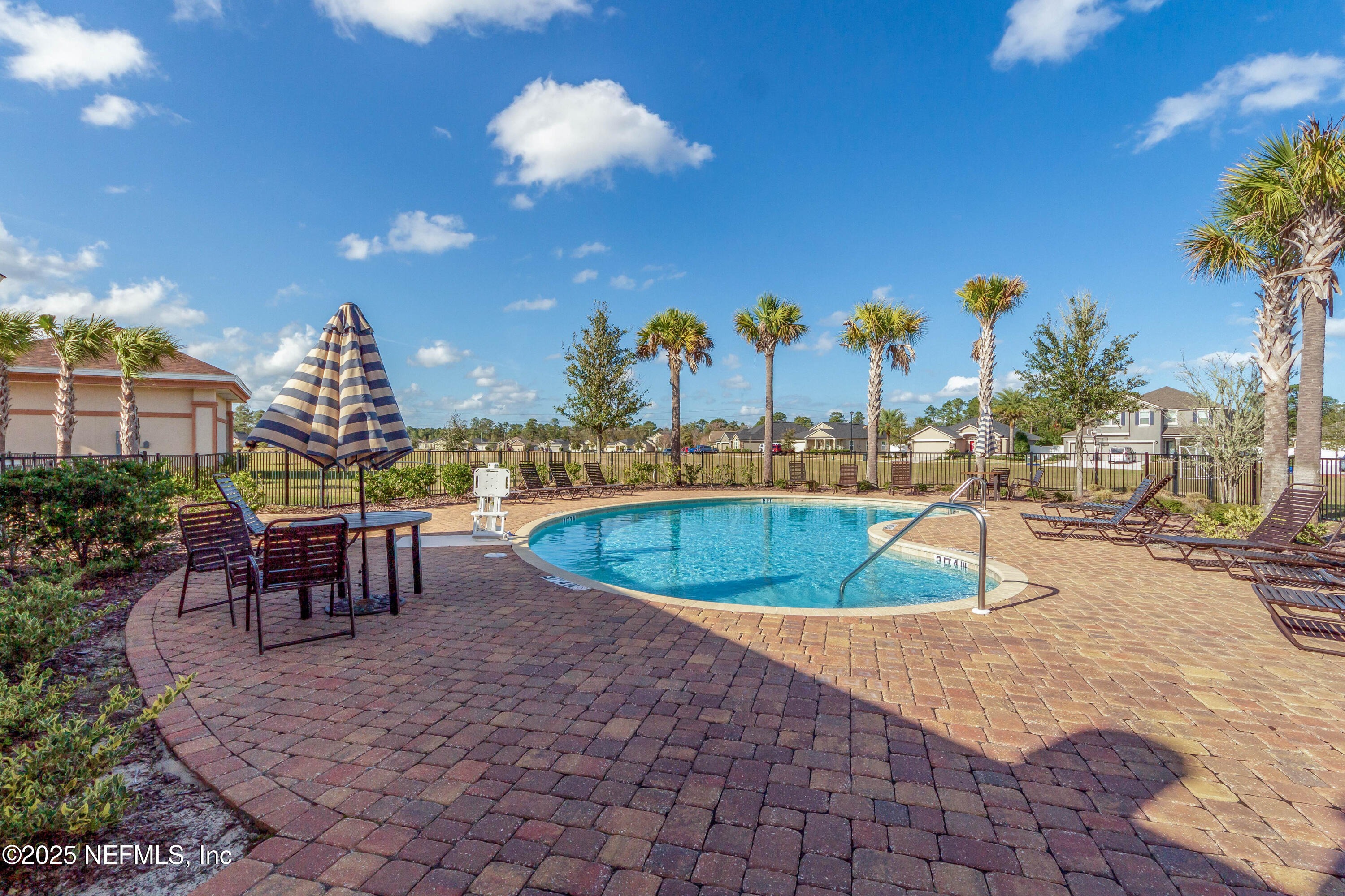 4100 Spring Creek Lane Middleburg, FL 32068 - Photo 45 of 58 an outdoor space with swimming pool and furniture