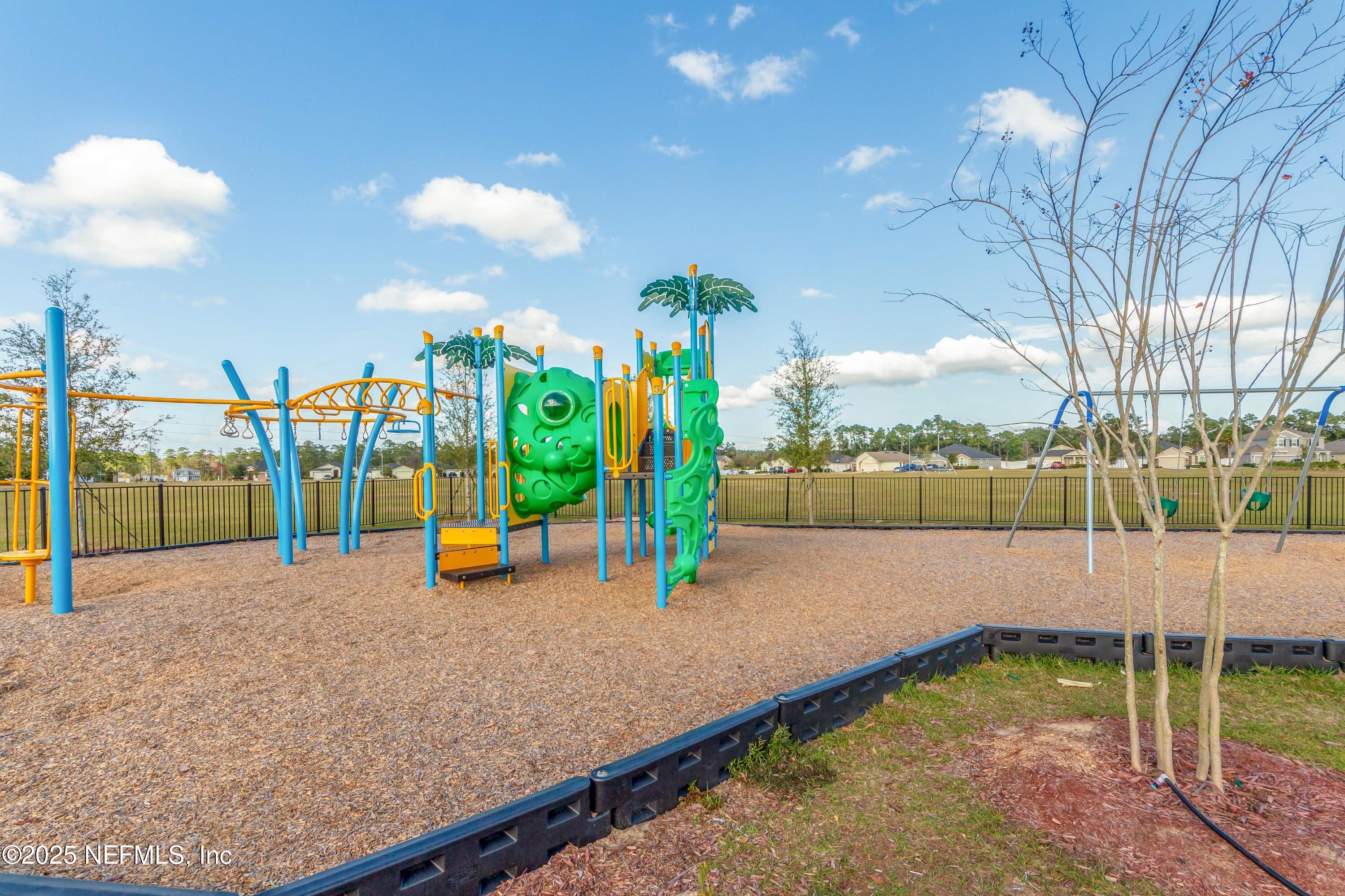 4100 Spring Creek Lane Middleburg, FL 32068 - Photo 46 of 58 a view of a garden with an outdoor space