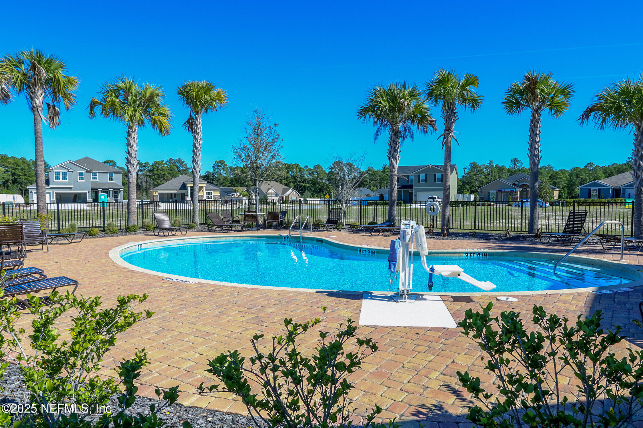 4100 Spring Creek Lane Middleburg, FL 32068 - Photo 50 of 58 a view of a swimming pool with a patio