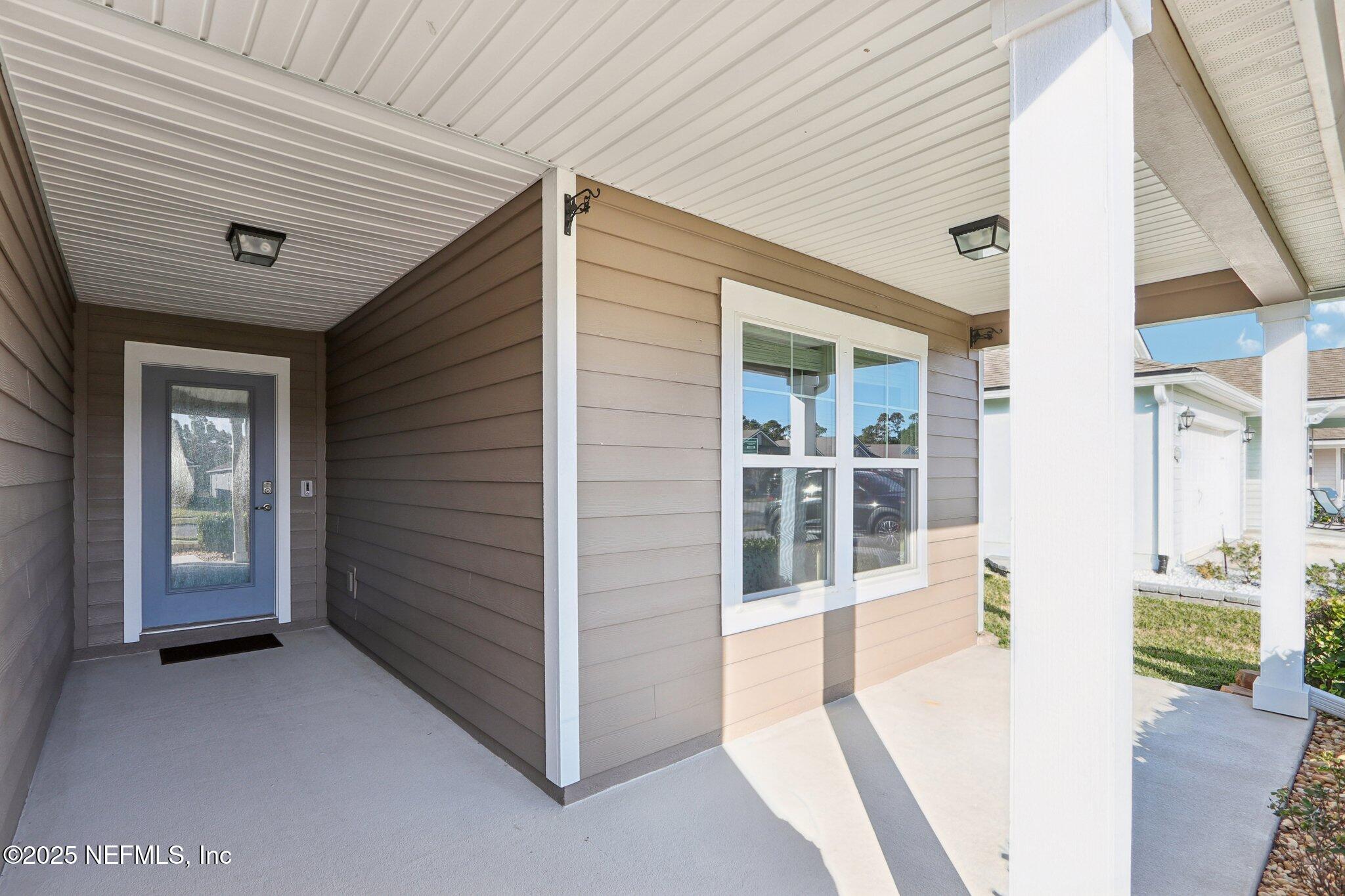 4100 Spring Creek Lane Middleburg, FL 32068 - Photo 5 of 58 a view of front door of house