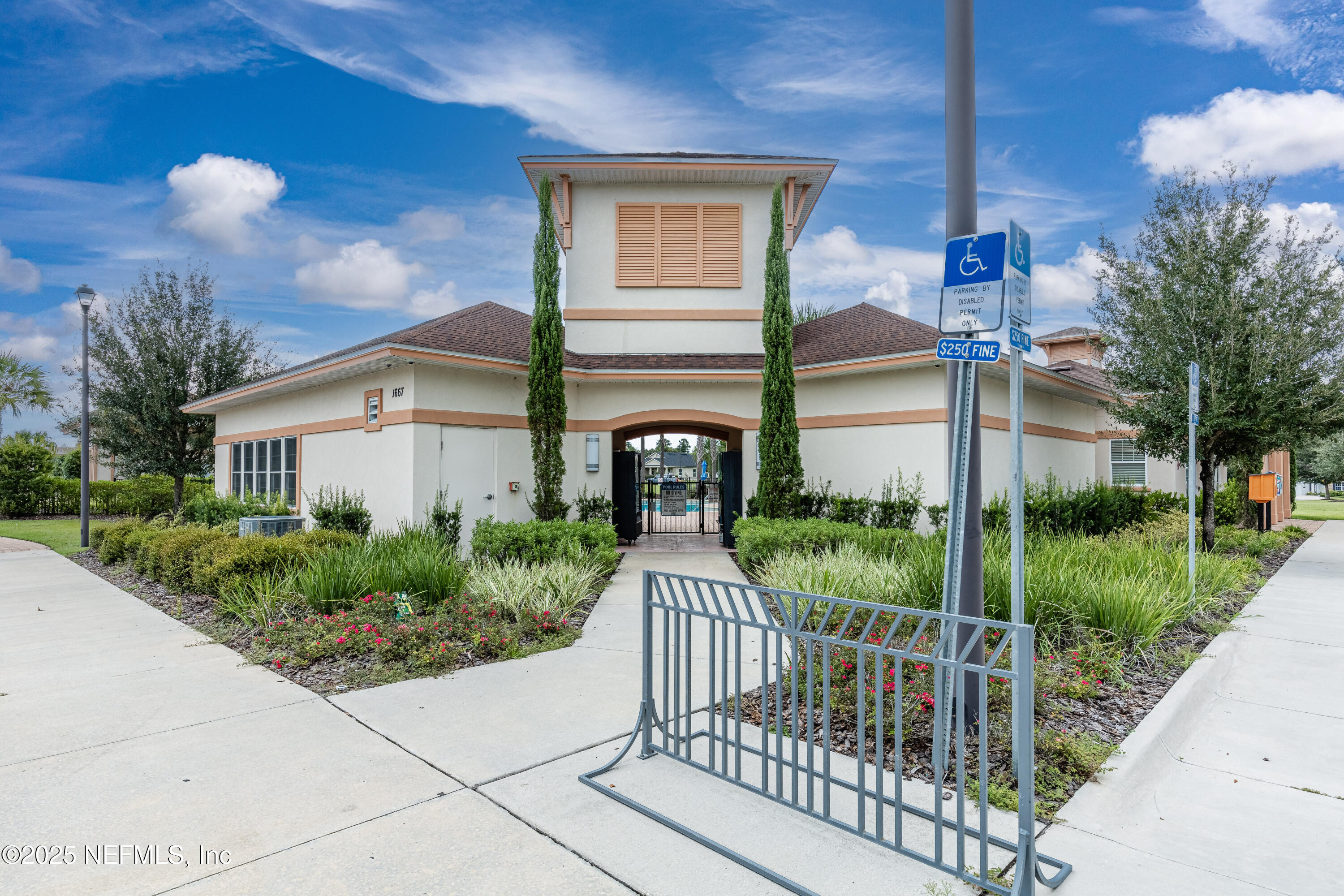 4100 Spring Creek Lane Middleburg, FL 32068 - Photo 53 of 58 a front view of a house with garden
