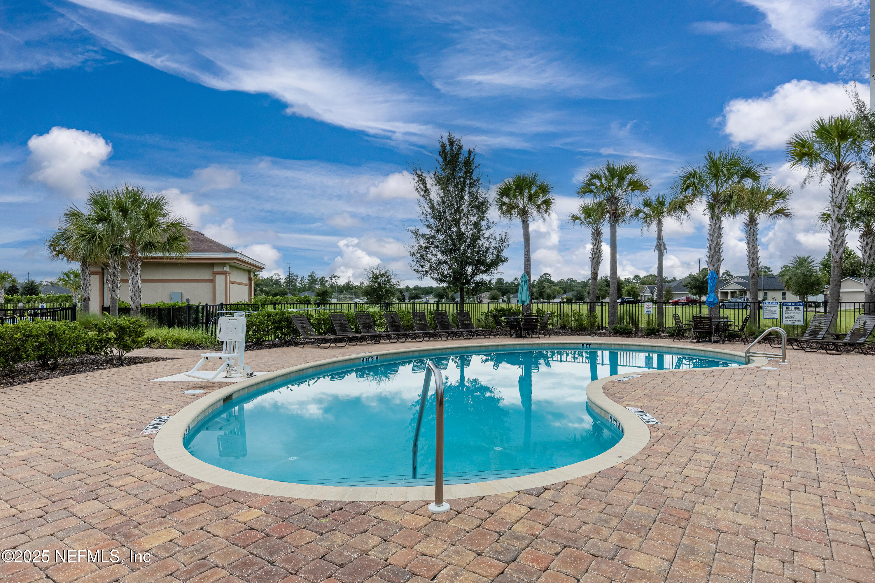 4100 Spring Creek Lane Middleburg, FL 32068 - Photo 56 of 58 a view of a swimming pool with a patio