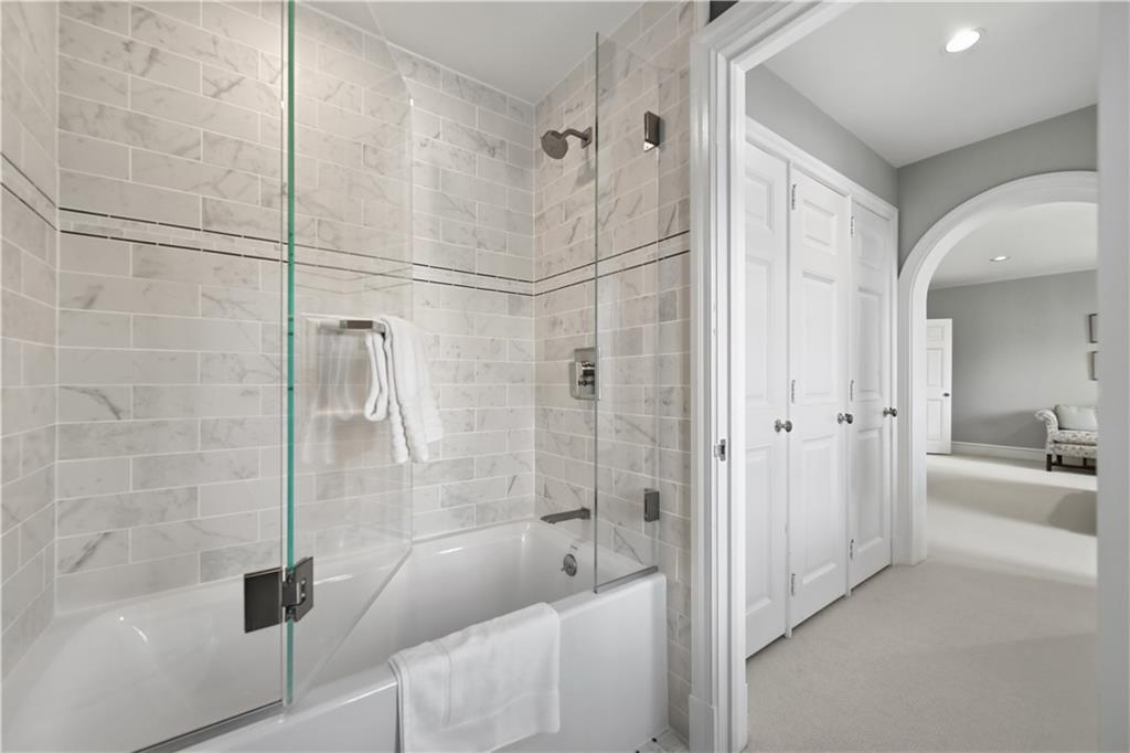 600 Backbone Road Sewickley, PA 15143 - Photo 43 of 50 A glass-enclosed shower and refined finishes give this bath a polished, contemporary feel. The space is simple, bright, and thoughtfully done.