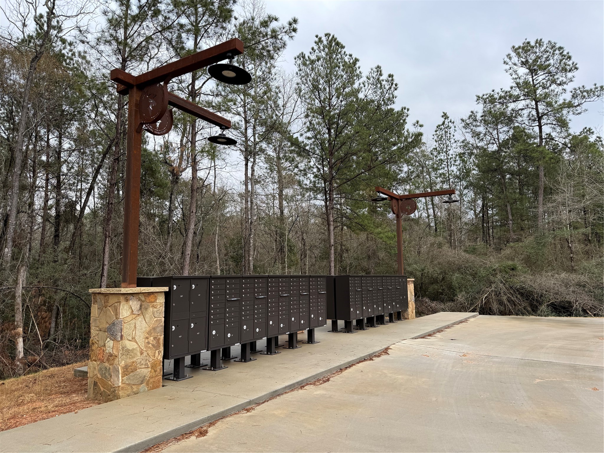 122 Signal Road Willis, TX 77378 - Photo 7 of 8 Secure and well-maintained community mailbox area, designed for convenience and ease of access for residents in Deer Forest.