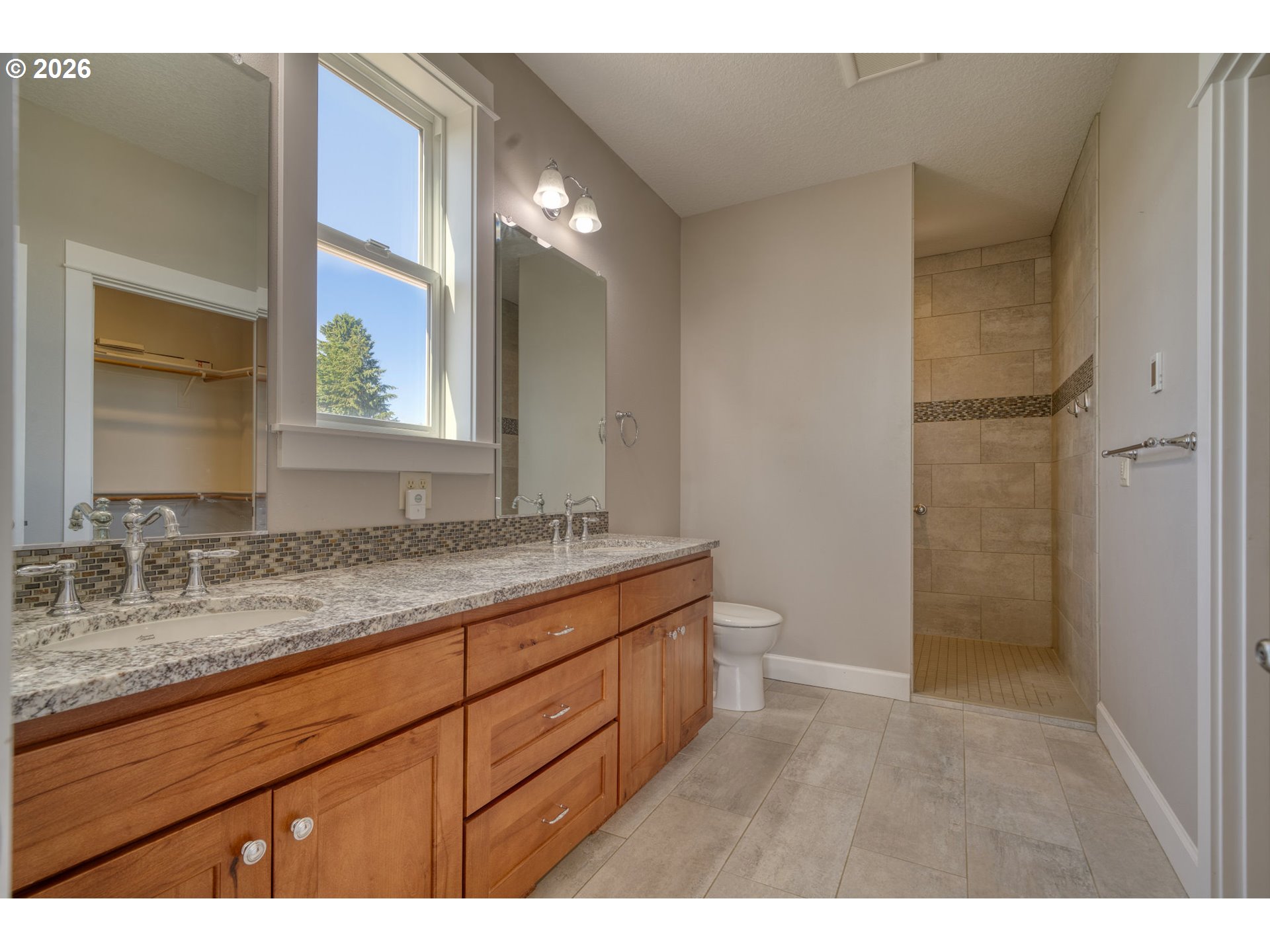 33058 Church Road Warren, OR 97053 - Photo 17 of 45 a bathroom with a granite countertop sink mirror and a toilet