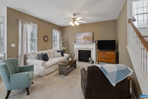 a view of a dining room with furniture and window