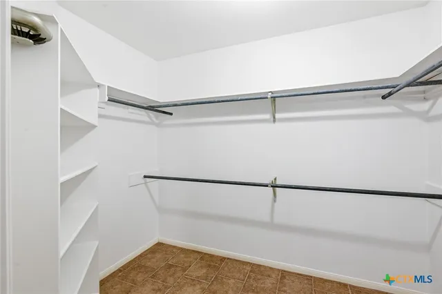 a view of small space with racks on the wall