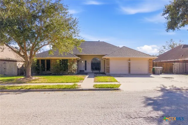 a view of a house with swimming pool and porch