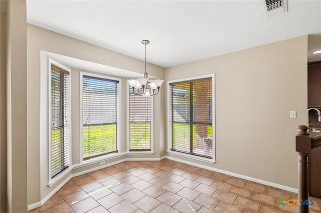 a view of an empty room with window