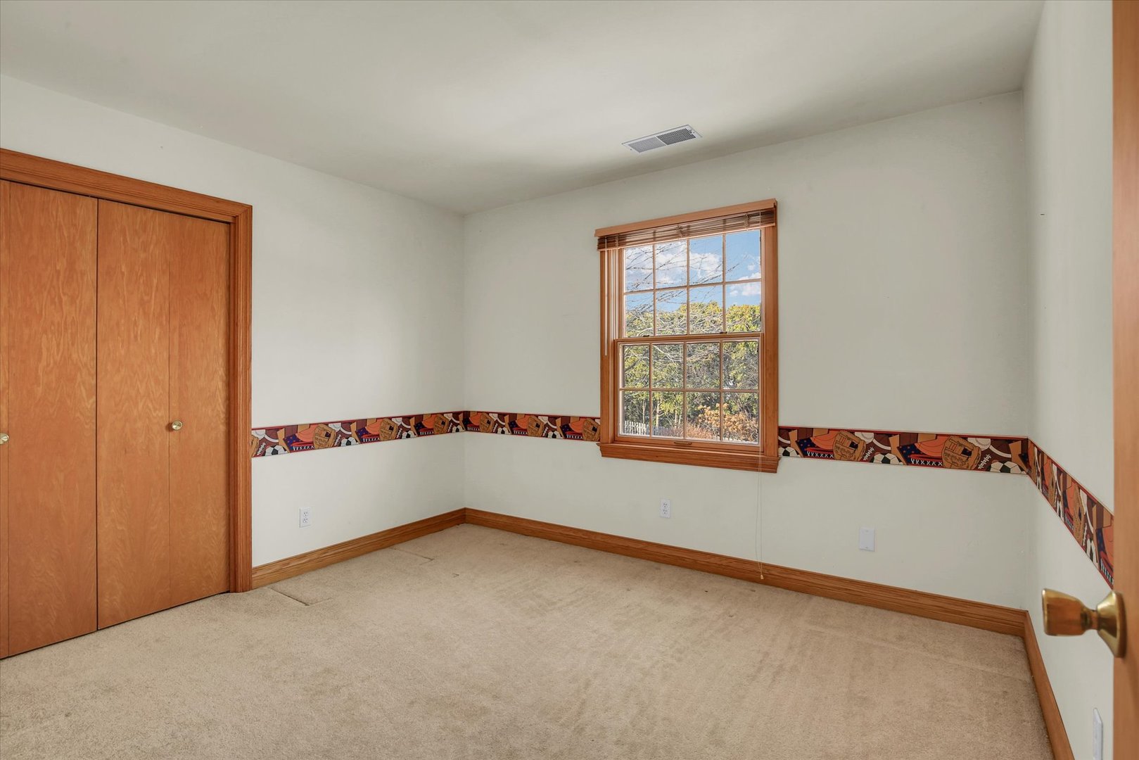 2002 O O Donnell Drive Champaign, IL 61821 - Photo 31 of 45 a view of an empty room with a window