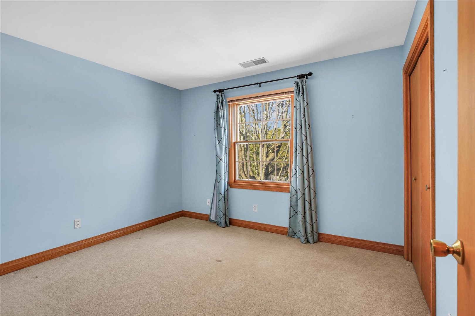 2002 O O Donnell Drive Champaign, IL 61821 - Photo 33 of 45 an empty room with windows