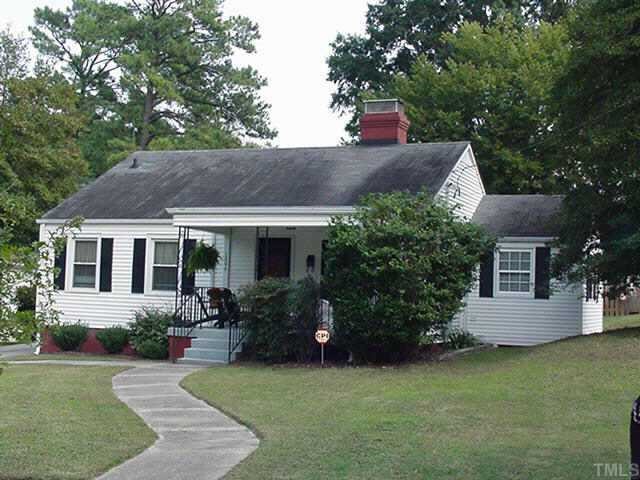 1206 Watauga Street Raleigh, NC 27604 - Photo 1 of 10 a front view of a house with garden