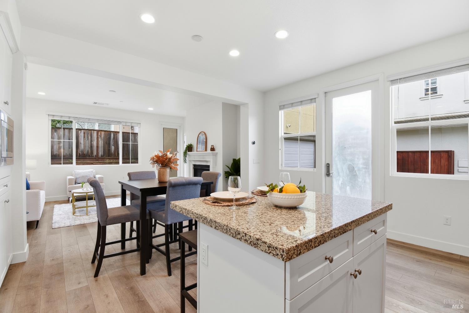 1612 Rose Clover Street Santa Rosa, CA 95403 - Photo 14 of 40 a living room with granite countertop furniture and a couch