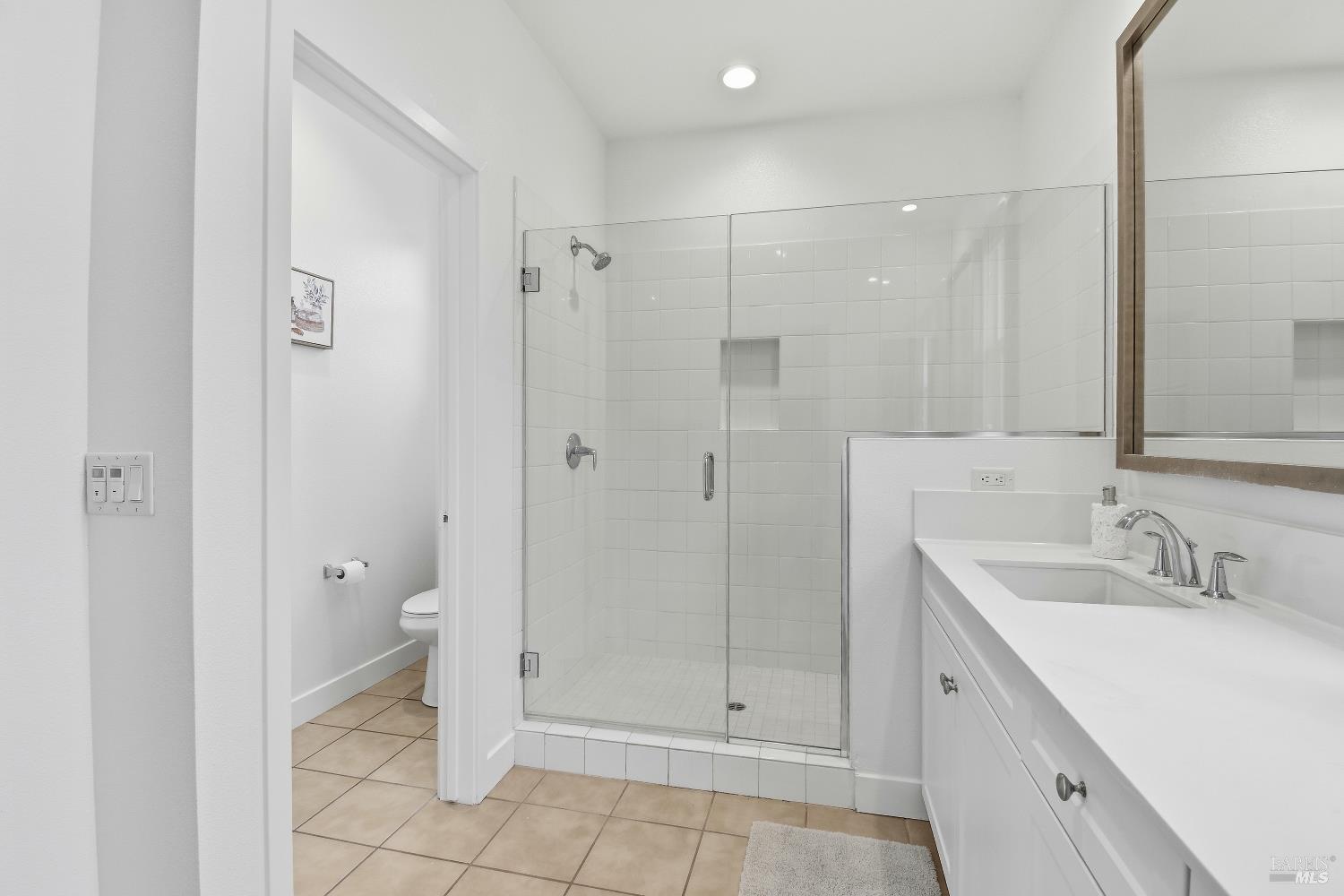 1612 Rose Clover Street Santa Rosa, CA 95403 - Photo 32 of 40 a bathroom with a sink a toilet and shower