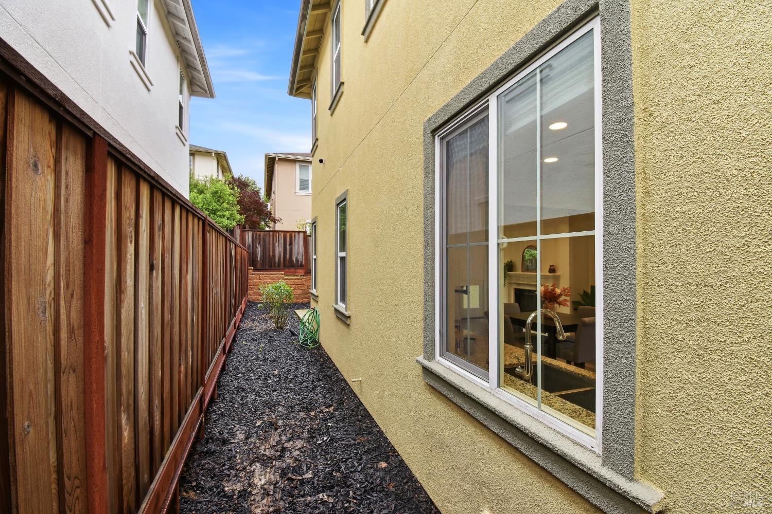 1612 Rose Clover Street Santa Rosa, CA 95403 - Photo 39 of 40 a view of a balcony with a potted plant and stairs