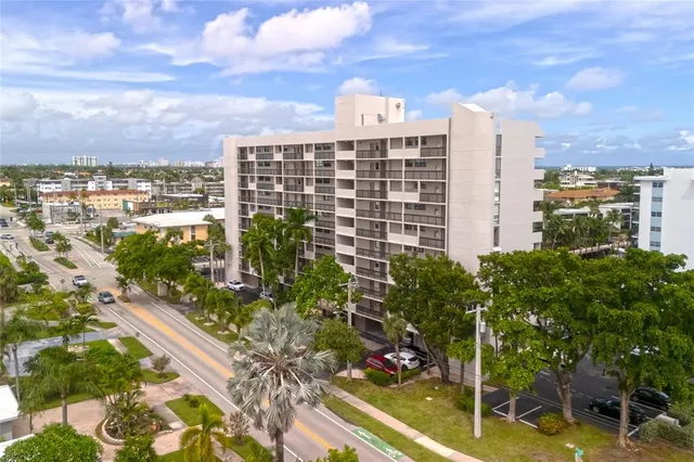 a view of a city with an ocean