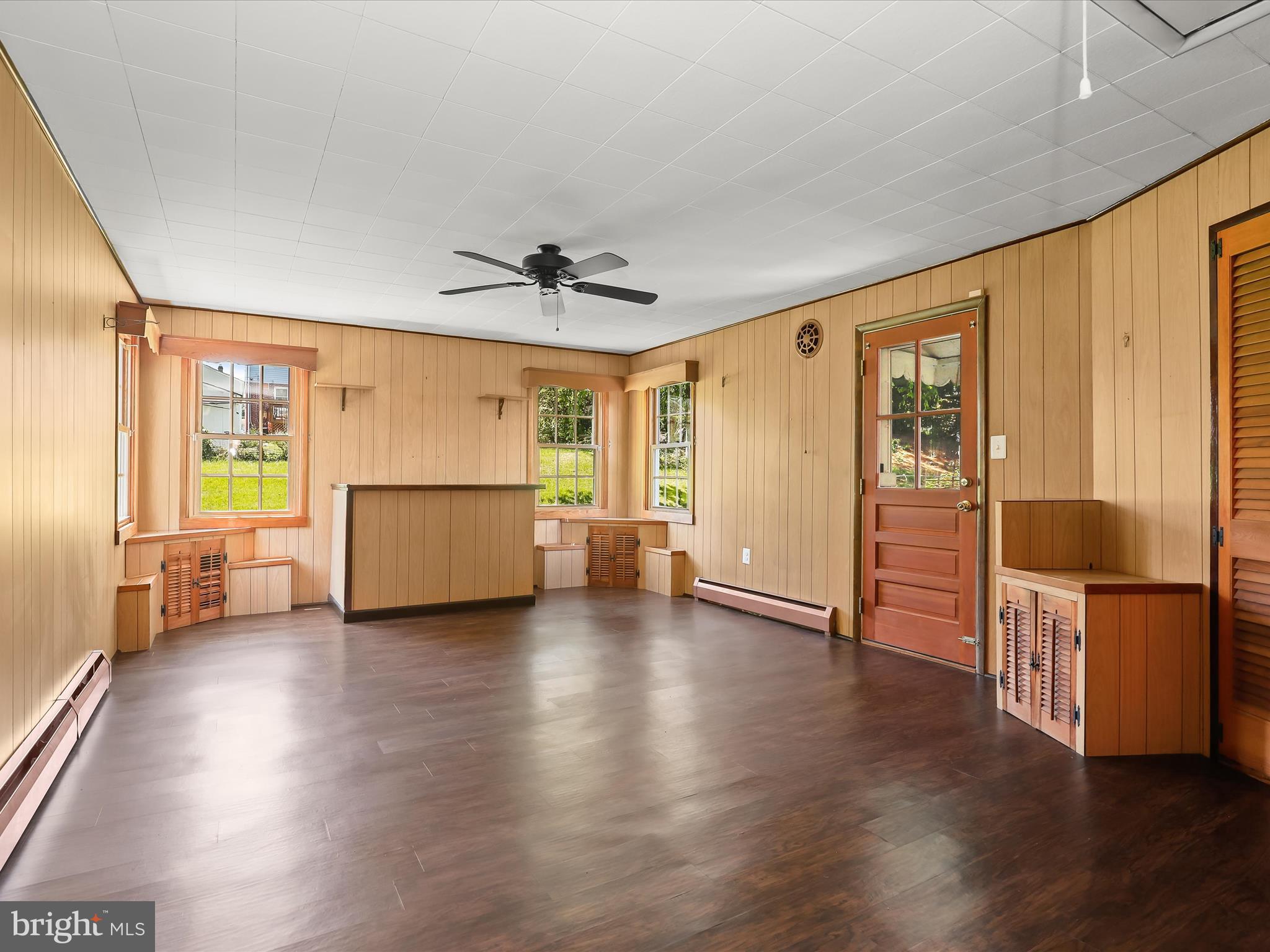 1229-7 Seven Oaks Road Halethorpe, MD 21227 - Photo 20 of 38 a view of a livingroom with furniture wooden floor and windows