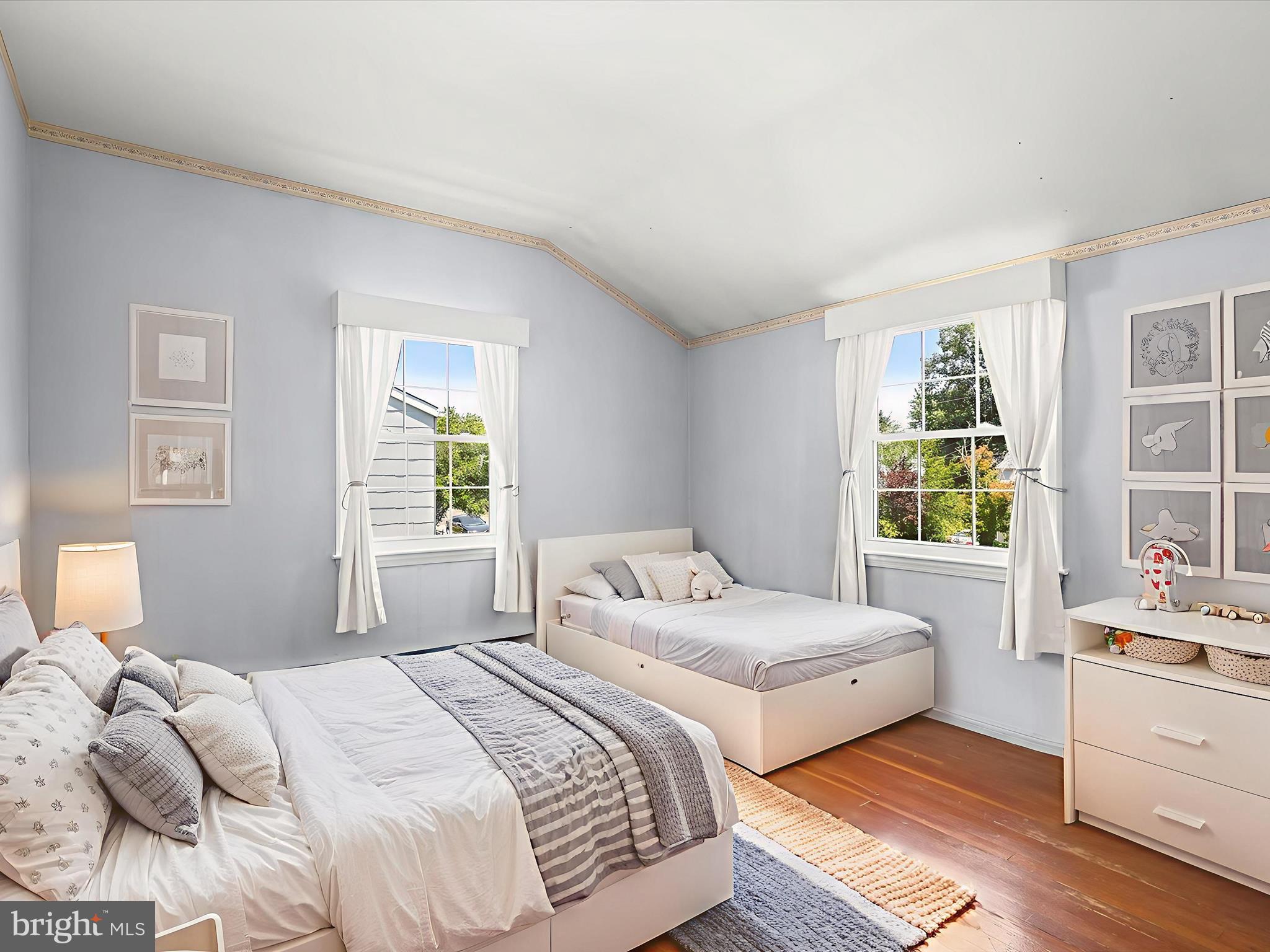 1229-7 Seven Oaks Road Halethorpe, MD 21227 - Photo 26 of 38 a bedroom with a bed and a window