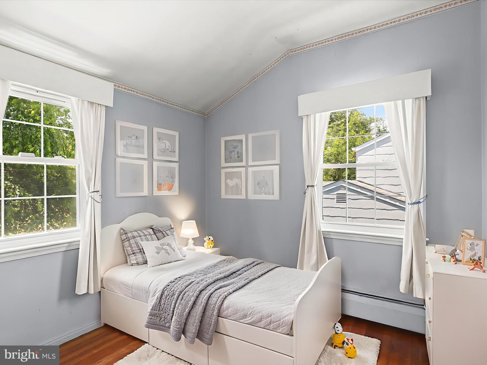 1229-7 Seven Oaks Road Halethorpe, MD 21227 - Photo 28 of 38 a bedroom with a bed and a window