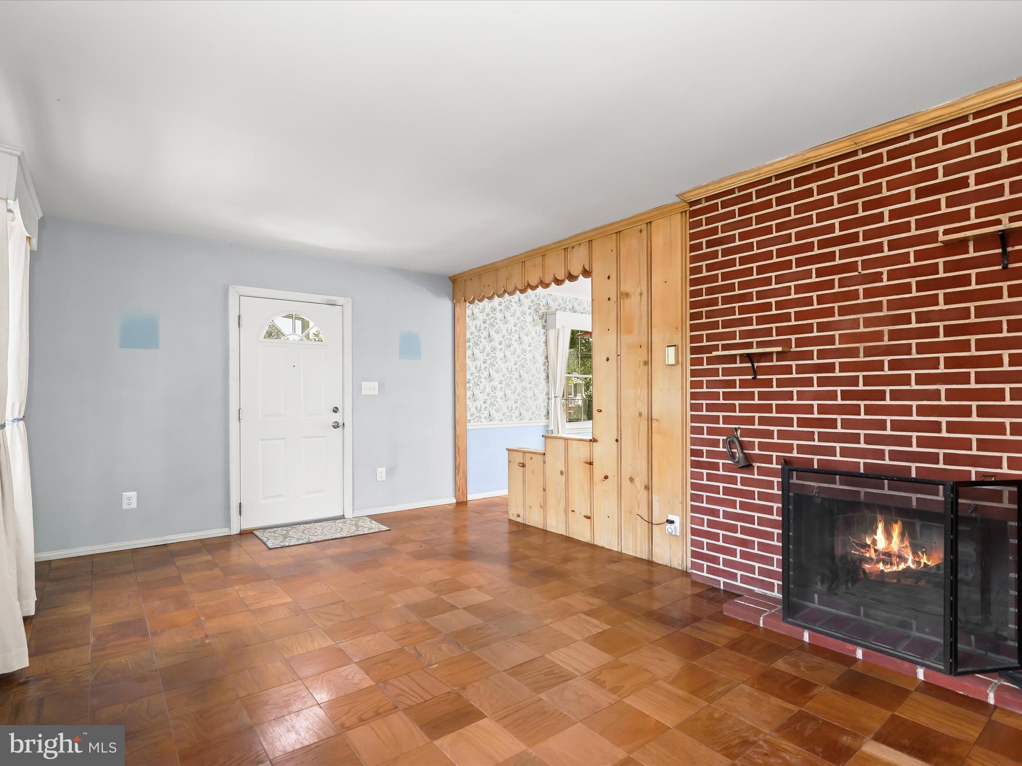 1229-7 Seven Oaks Road Halethorpe, MD 21227 - Photo 9 of 38 a view of empty room with a fireplace