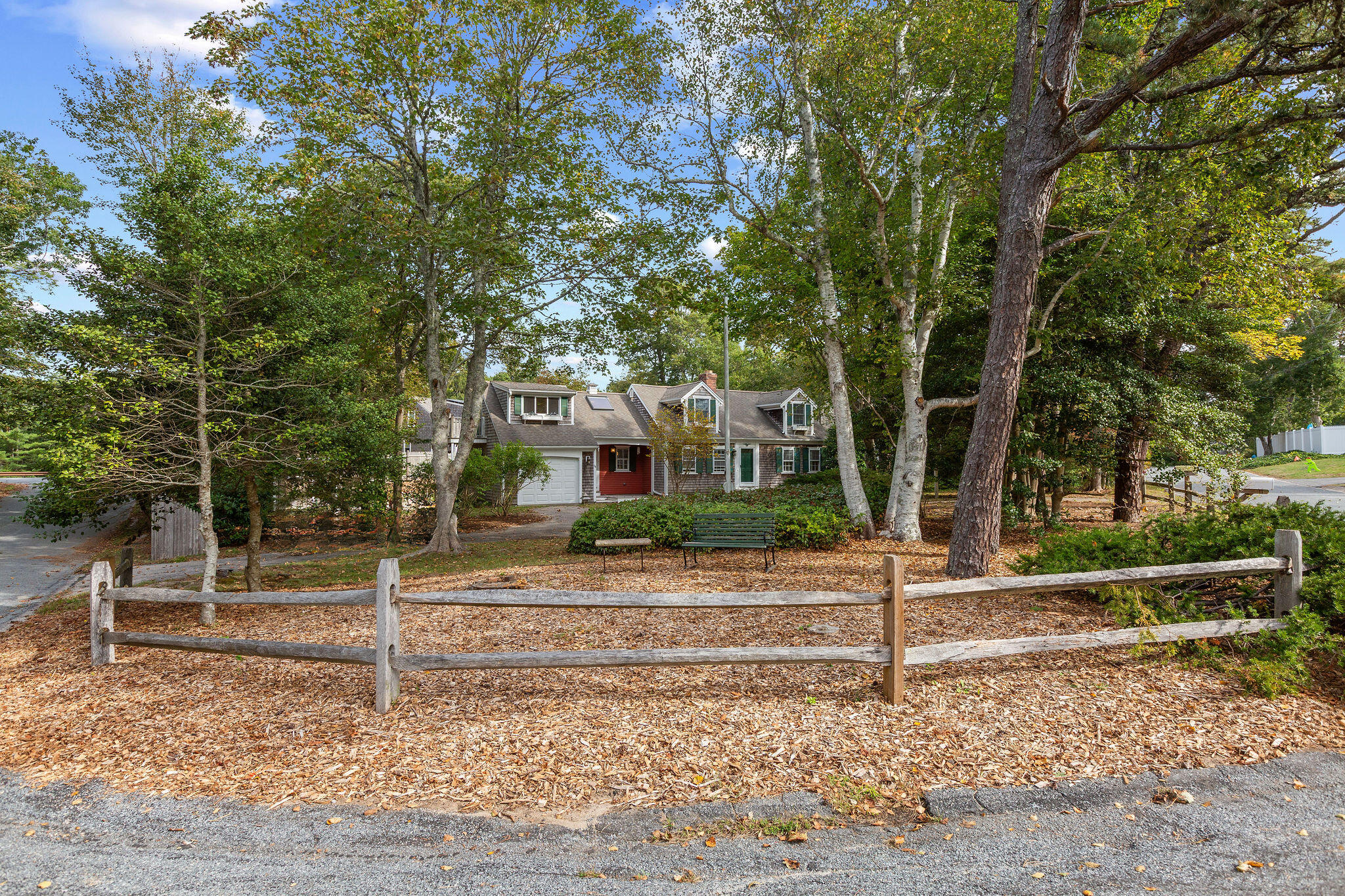 44 Beriah Brooks Road Harwich, MA 02645 - Photo 2 of 43 a front view of a house with a yard