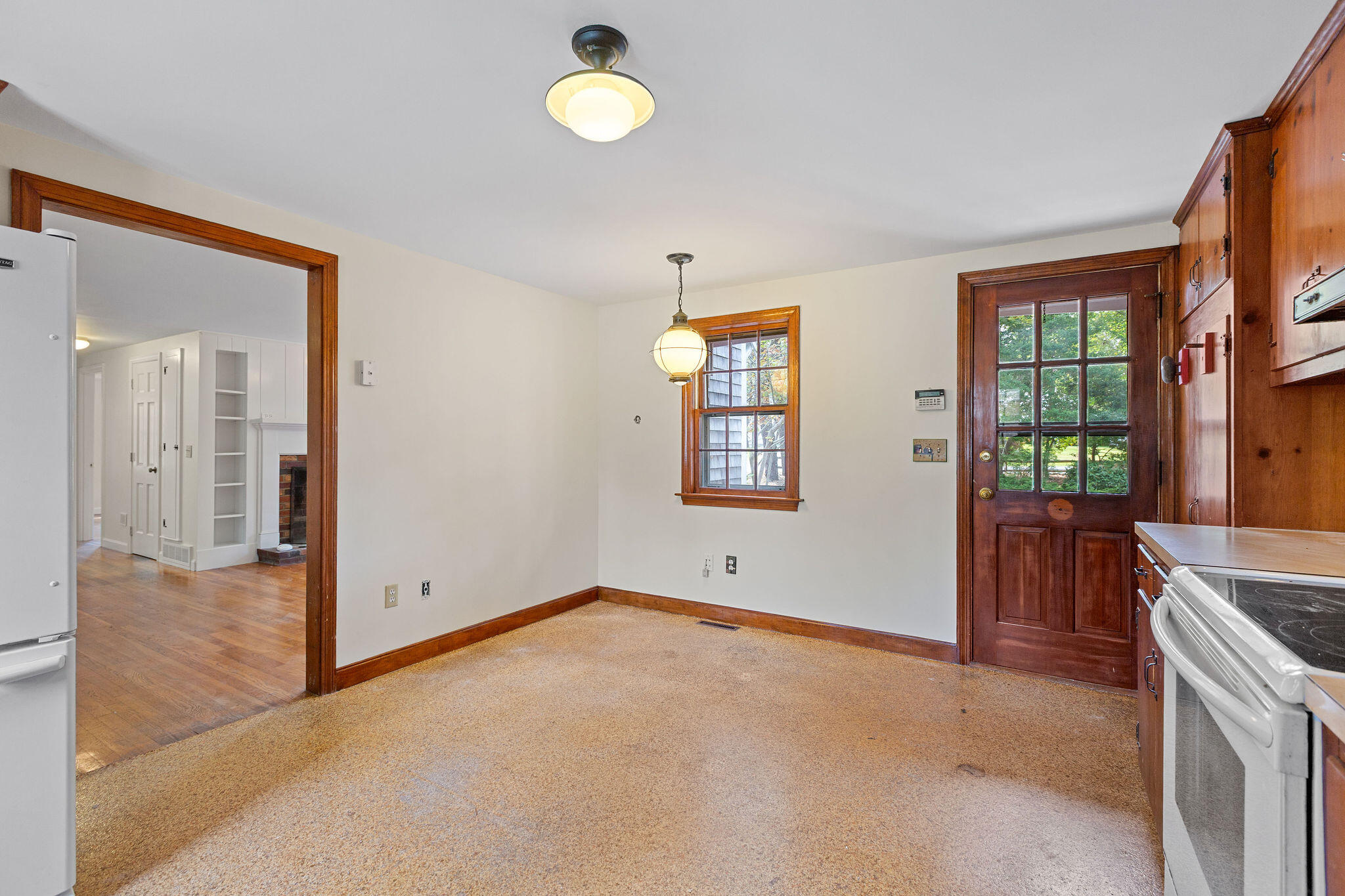 44 Beriah Brooks Road Harwich, MA 02645 - Photo 22 of 43 an empty room with windows and cabinet