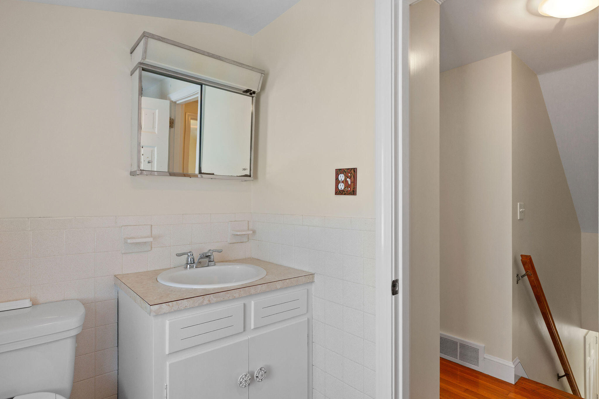 44 Beriah Brooks Road Harwich, MA 02645 - Photo 34 of 43 a bathroom with a toilet sink and mirror