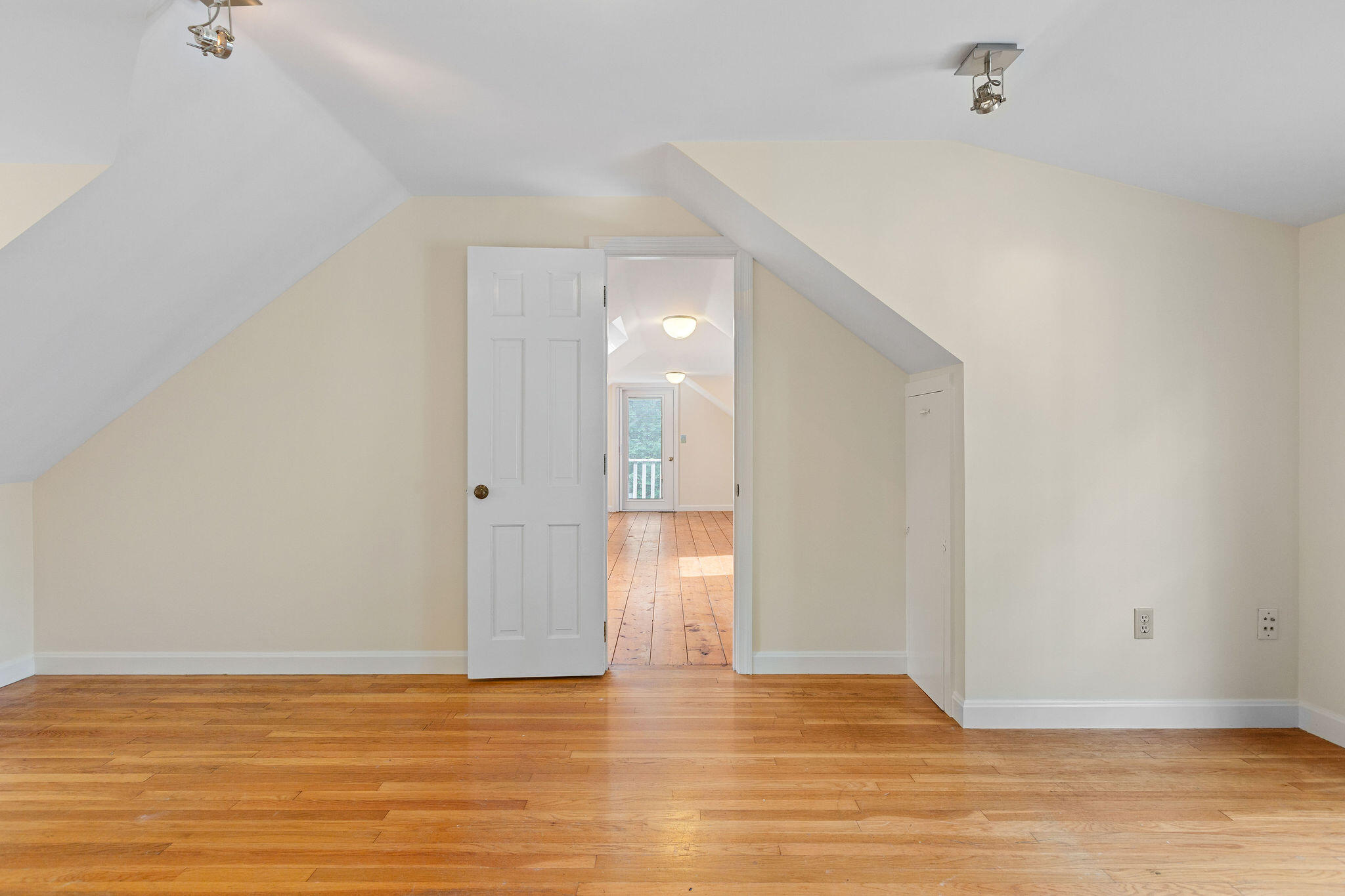 44 Beriah Brooks Road Harwich, MA 02645 - Photo 35 of 43 a view of an empty room with wooden floor and a window