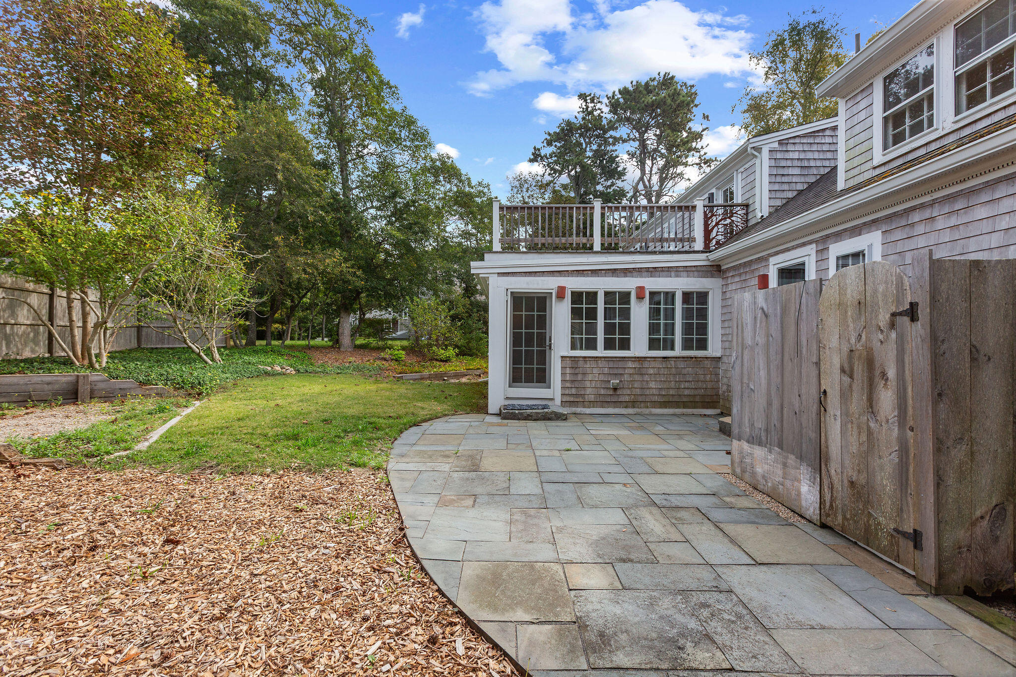 44 Beriah Brooks Road Harwich, MA 02645 - Photo 9 of 43 a view of back yard of the house