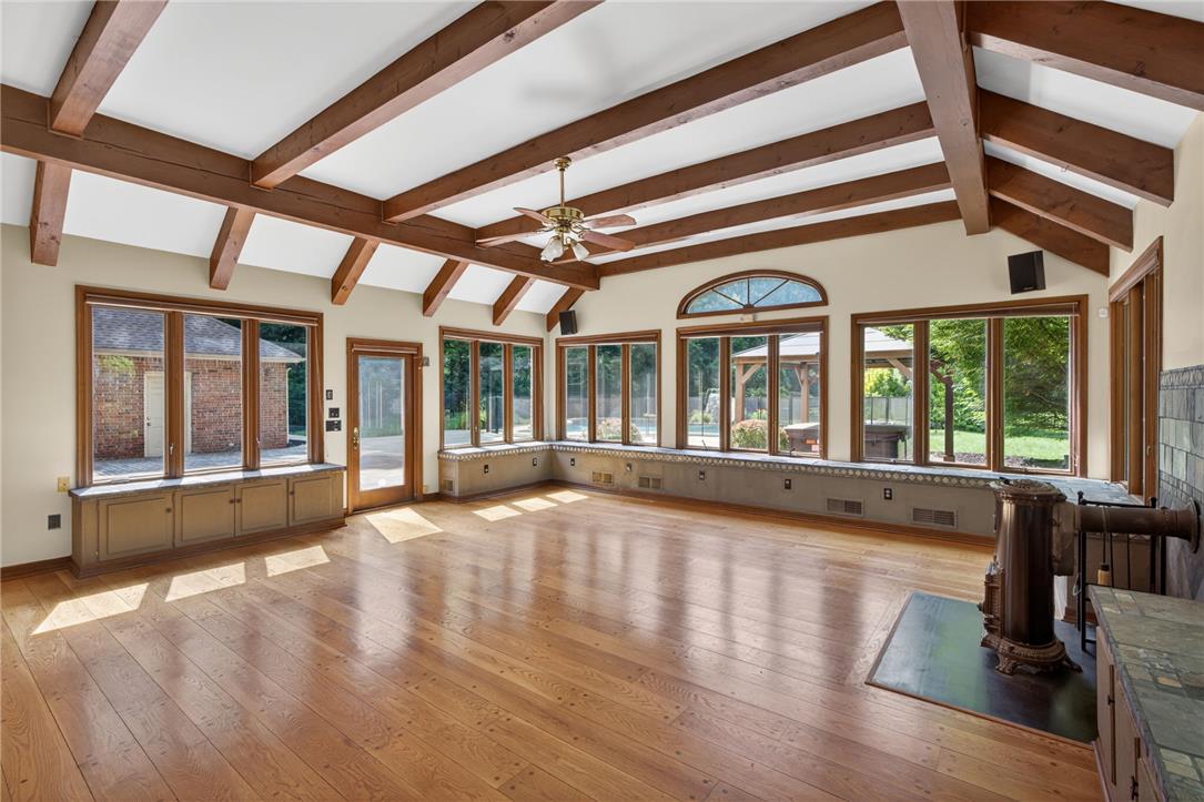 1371 Stoke Park Road Bethlehem, PA 18017 - Photo 15 of 55 a view of an empty room with wooden floor and a window