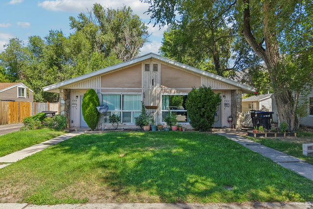 768 300 North Provo, UT 84606 - Photo 2 of 51 Dual-entry residence featuring a gabled roofline and stone facade accents