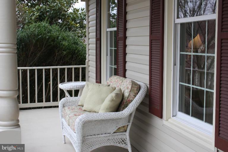 10169 Wavell Road Fairfax, VA 22032 - Photo 2 of 30 Inviting front porch across the front of the home