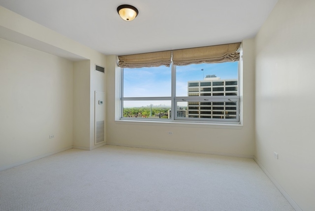 807 Davis Street, Unit 1504 Evanston, IL 60201 - Photo 11 of 14 a view of a room with a large window