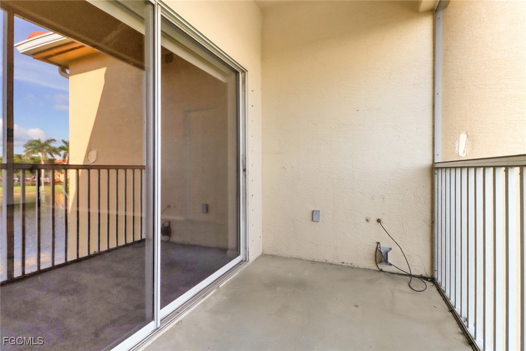 4214 Bellasol Circle, Unit 824 Fort Myers, FL 33916 - Photo 11 of 27 a view of a hallway