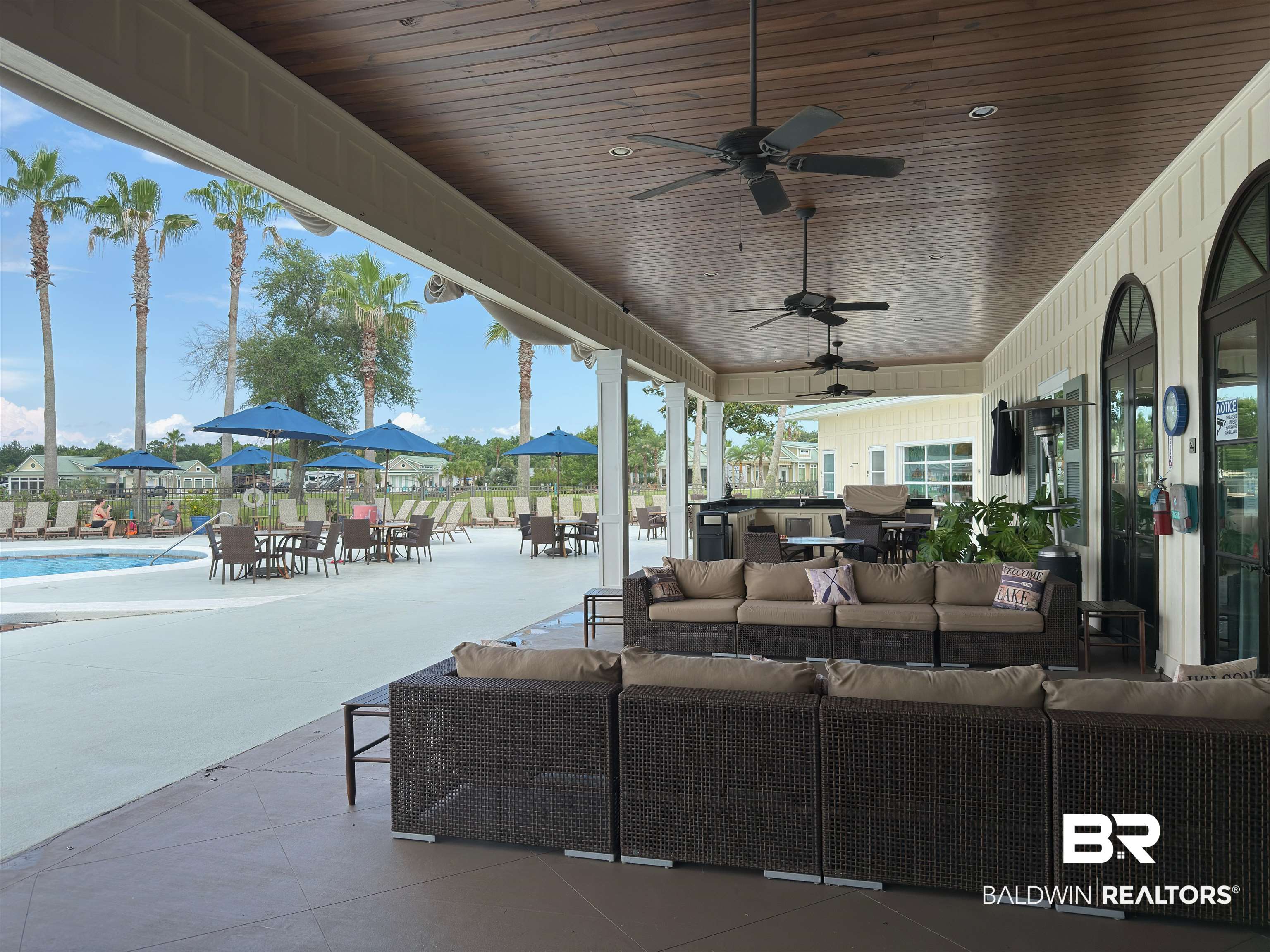28170 Migratory Way Elberta, AL 36530 - Photo 26 of 37 View of patio / terrace with an outdoor hangout area, a ceiling fan, a community pool, and outdoor dining space