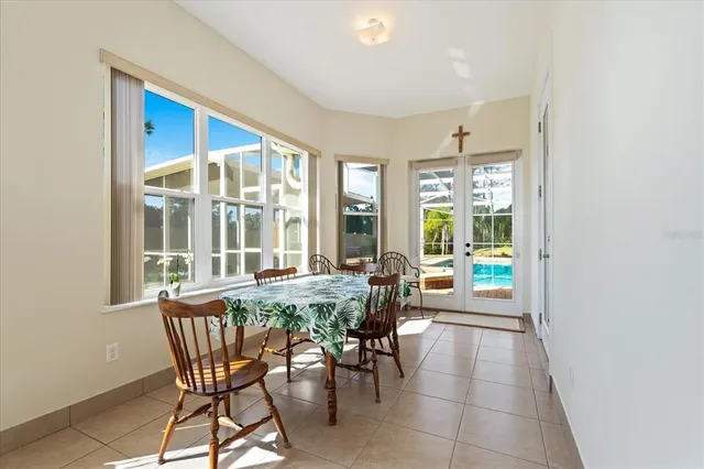 a view of swimming pool with seating space