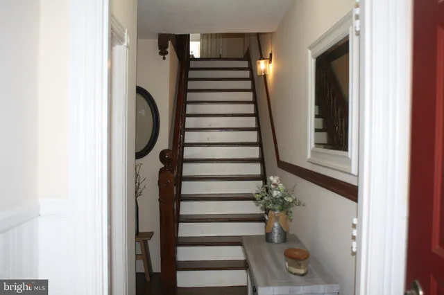 a view of entryway with wooden floor